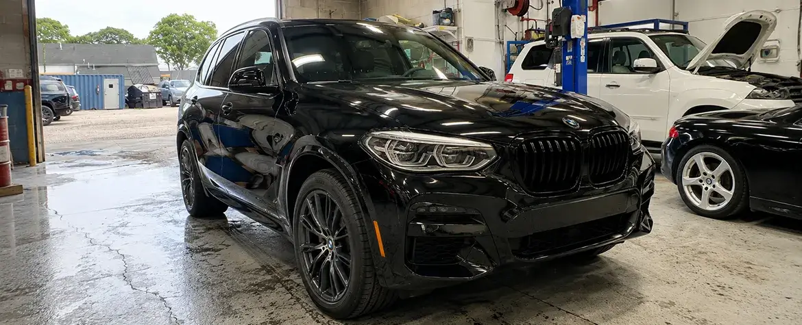 BMW inside Fireplace Auto Collision's certified repair facility in East Hampton, NY