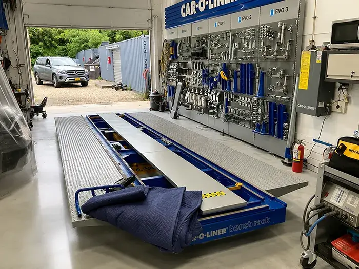 Car-O-Liner structural repair equipment used for precision collision repairs at Fireplace Auto Collision.