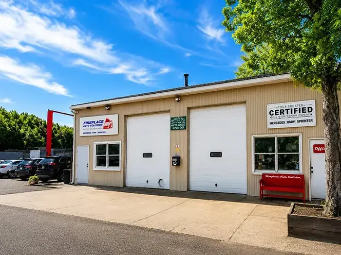 Front entrance of Fireplace Auto Collision, a certified collision repair facility in East Hampton, NY.