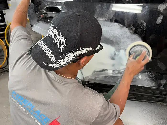 Automotive paint being mixed for accurate color matching at Fireplace Auto Collision.